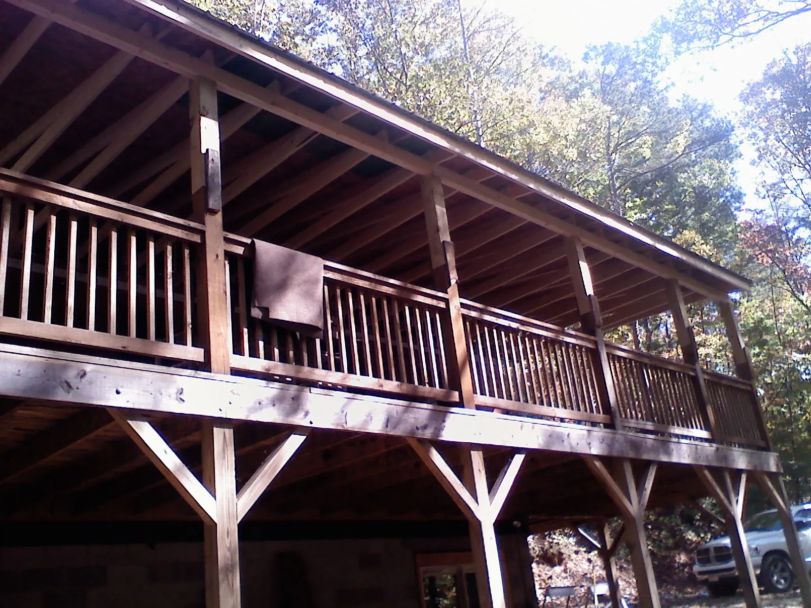 Timber framing under a new elevated porch and deck — Roof Leak Repair in Southfield by Roofing Brothers